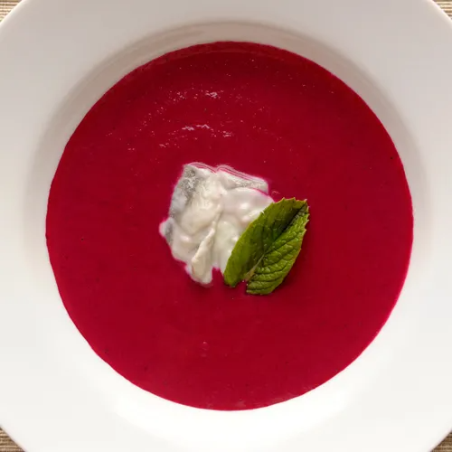 pickled herring in cream in borscht soup