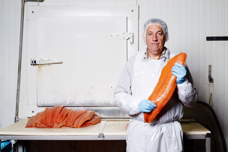 man with smoked salmon