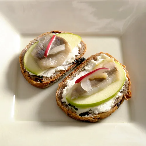 Acme Smoked Fish pickled herring in wine canape