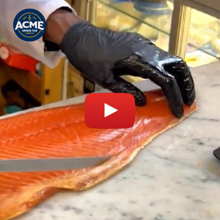 slicing smoked salmon