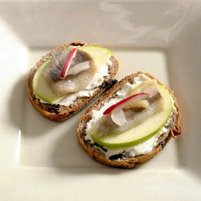 Pickled Herring Canape with Goat Cheese and Green Apple