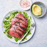 smoked tuna over greens, avocado, and radish