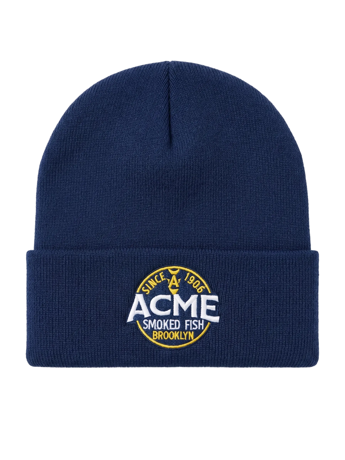 Navy blue beanie with ACME Smoked Fish Brooklyn logo on a white background